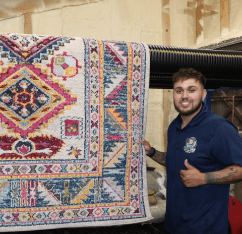 Tony from Green-Gen standing next to freshly cleaned oriental rug